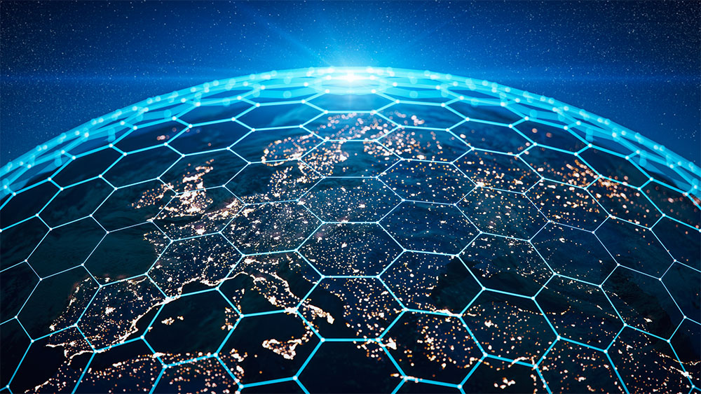 Earth at night viewed from space with illuminated hexagonal grid overlay.